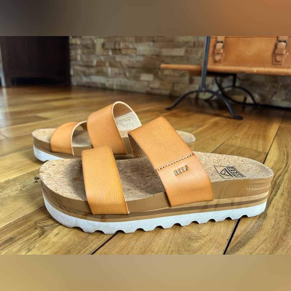 Orange leather strap sandals with white sole. Very comfortable. Only worn once.